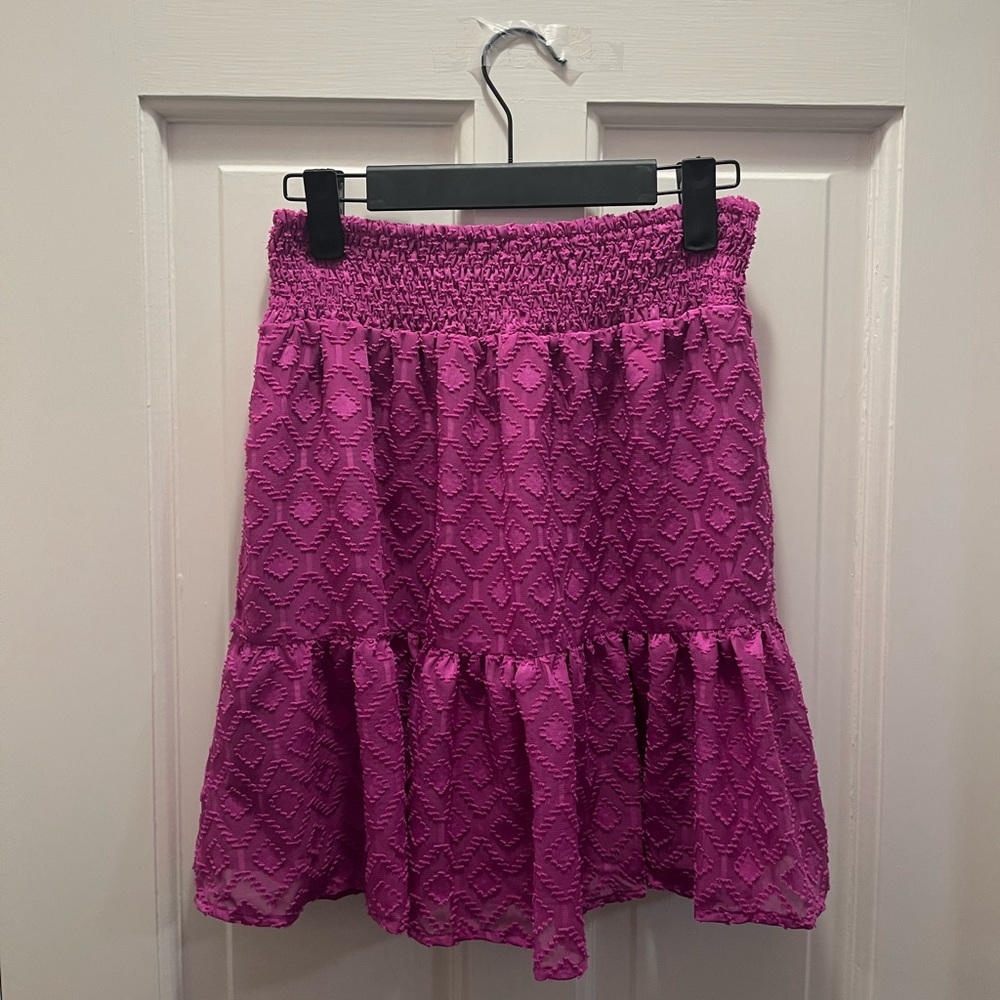 Purple knee length skirt